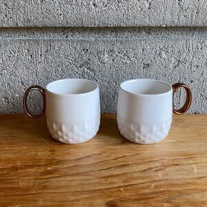 Starbucks Bundle of 2 White Ceramic Mugs with Copper Painted Handles